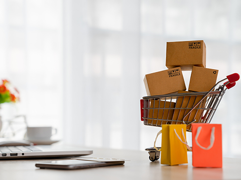 Ecommerce shopping cart, laptop and mobile